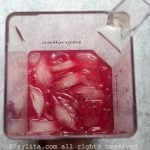 Cranberry pisco sour preparation in blender