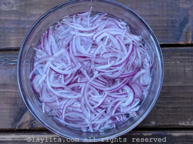 Soak red onions in water
