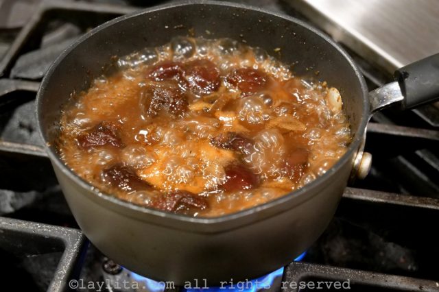 Making a gravy sauce with white wine plan sauces, prunes, and shallots