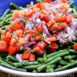 Green bean salad with tomatoes, red onions, cilantro and lime