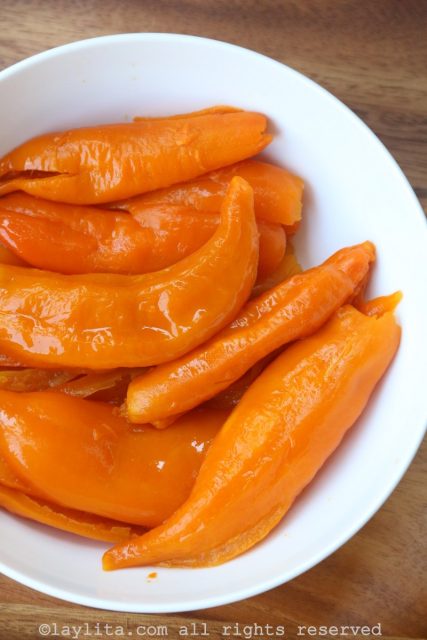 Use gloves to peel the hot peppers, the skin will come off easily.