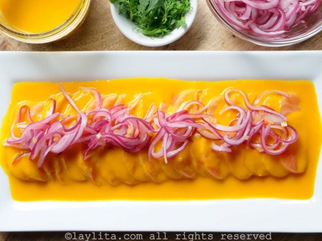 Salmon tiradito with passion fruit sauce