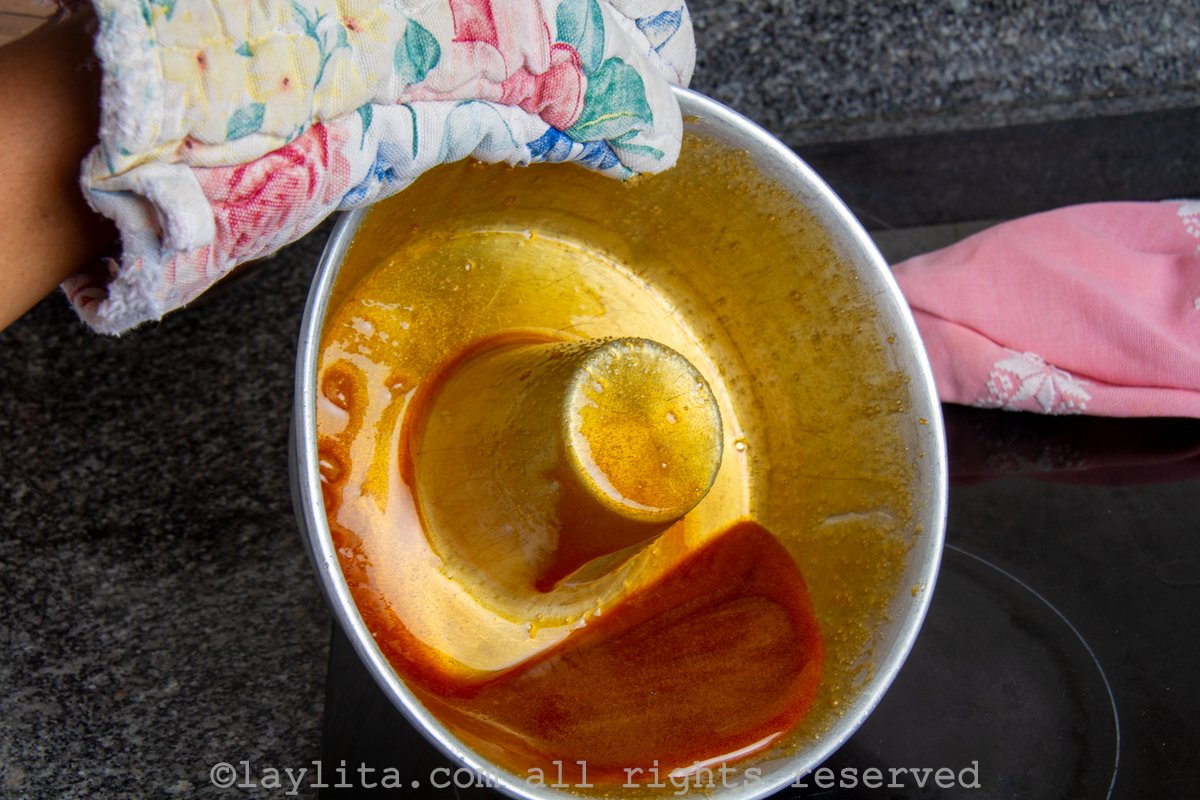 Large cake mold with caramelized sugar in the bottom.