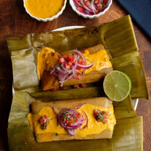 Photos of two Ecuadorian fish bollos or plantain tamales topped with peanut sauce and pickled onions