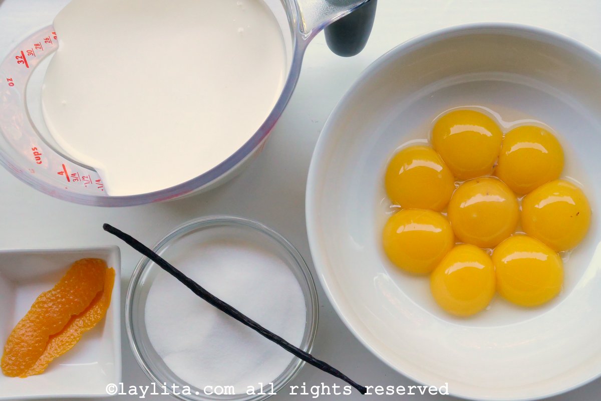 Ingredients for homemade creme brulee recipe: Cream, egg yolks, sugar, vanilla bean pod, orange peel