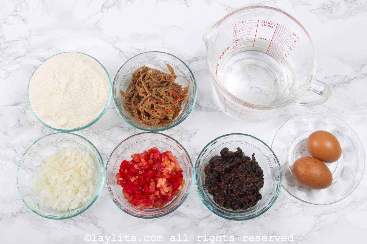 Ingredients needed to make arepas on a kitchen counter.
