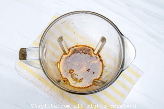 Refrito with peanut butter and fish broth in a blender.