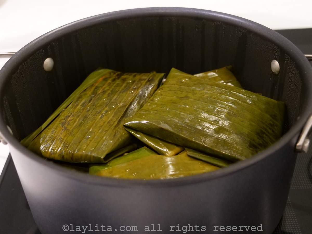 Bollos in a pot to be steamed