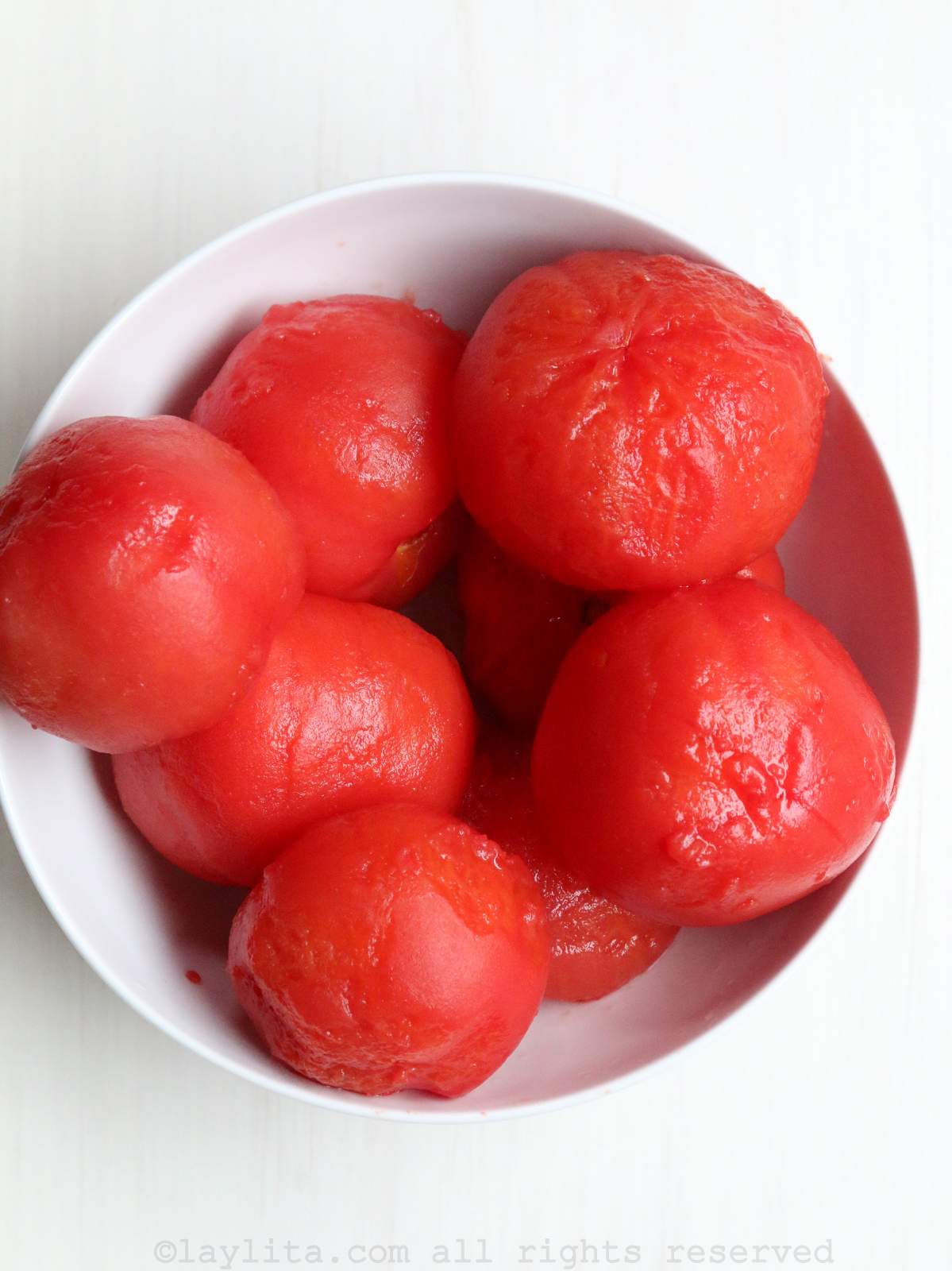 Peeled tomatoes in a bowl