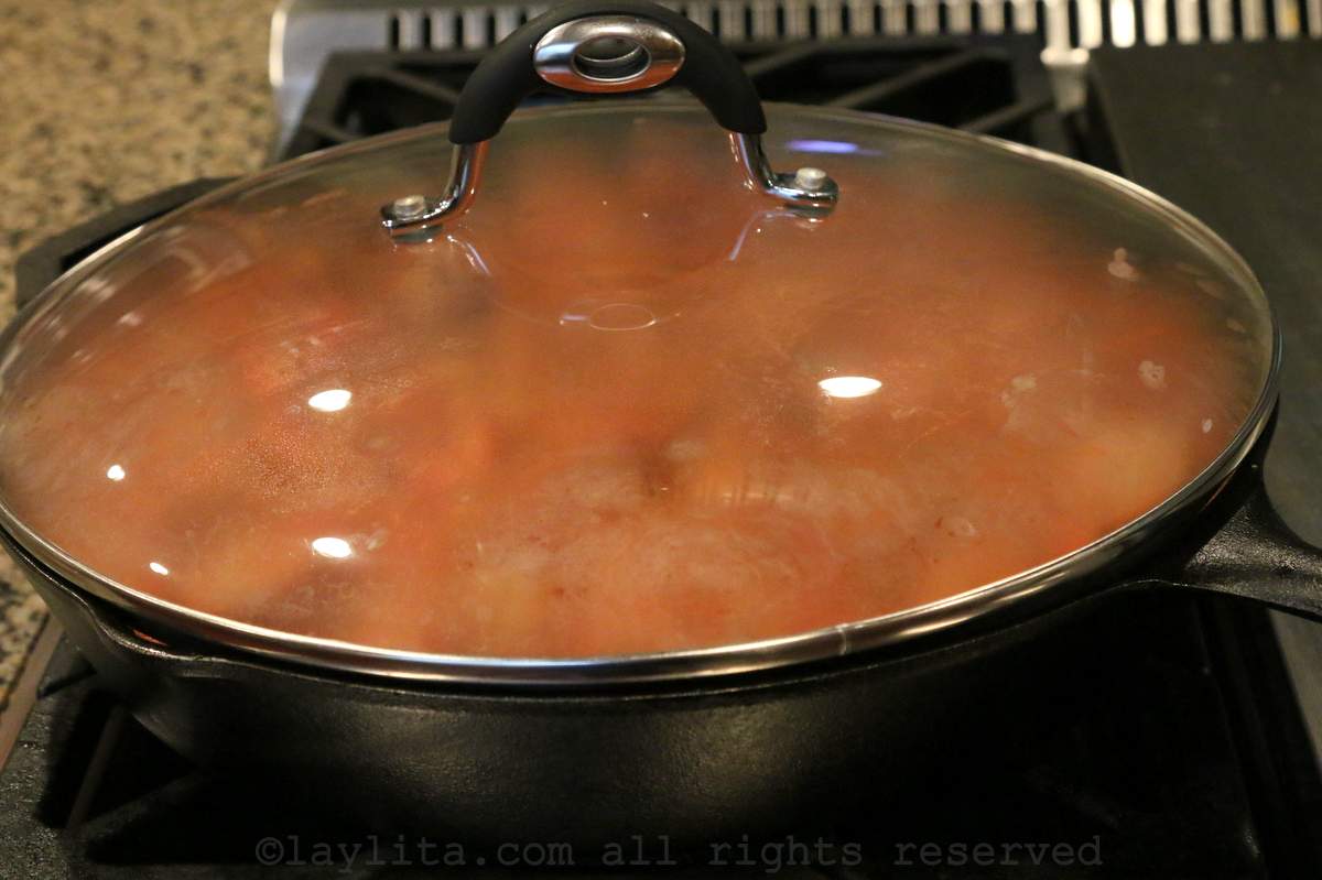 Rougail in a skillet with the lid on top.