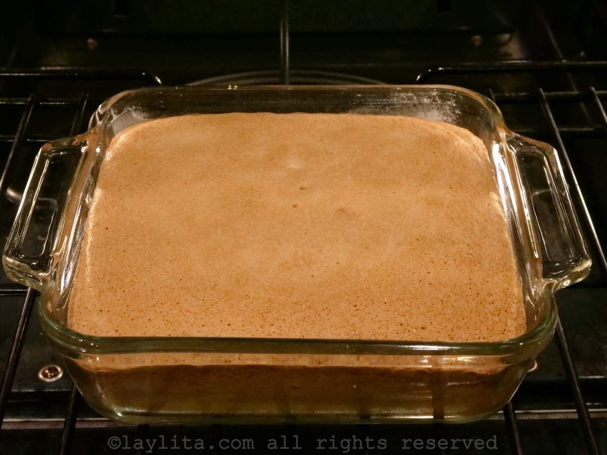 Cake after being baked in a baking dish.