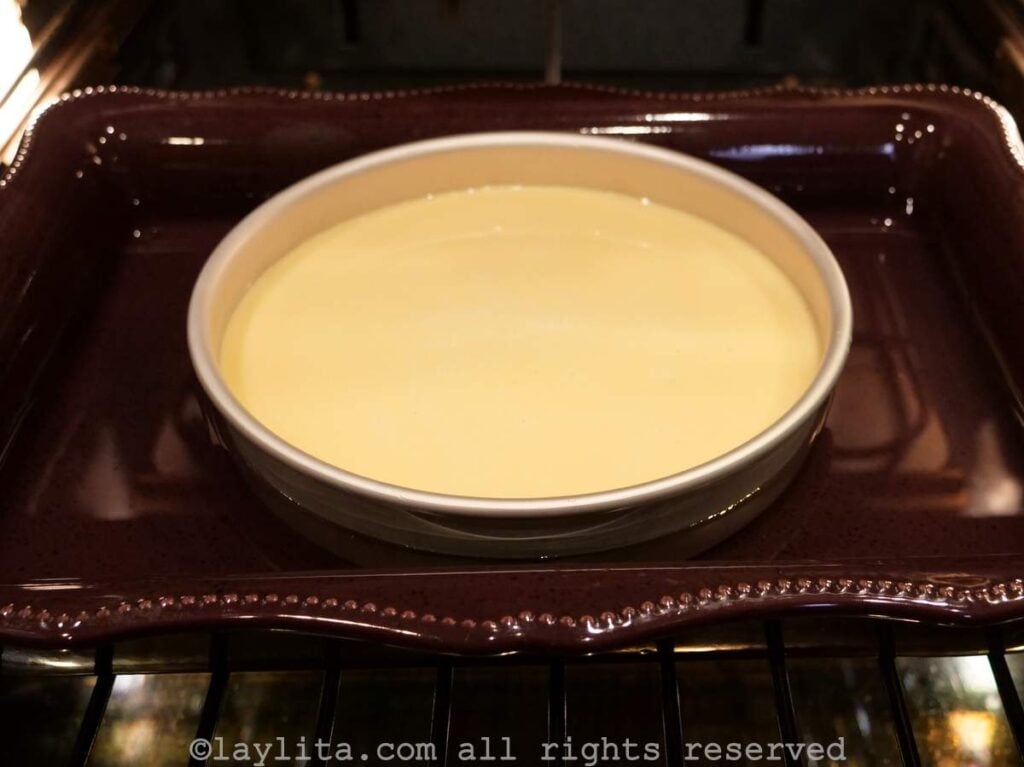 Cake pan with the liquid flan mixture in it.
