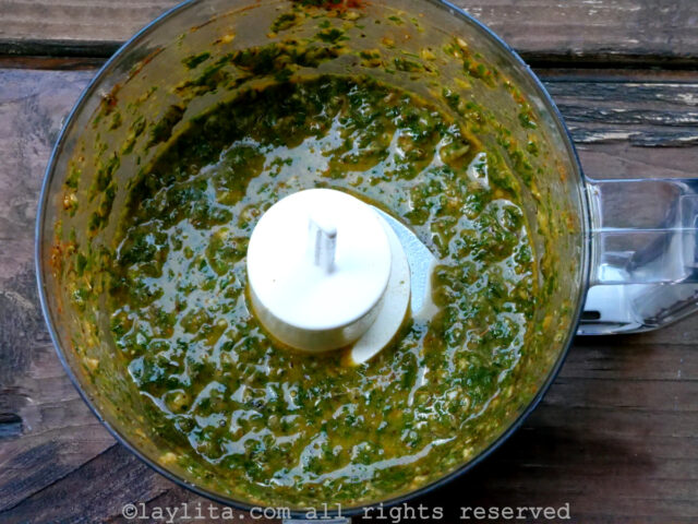 Garlic herb chimichurri in the food processor after being blended