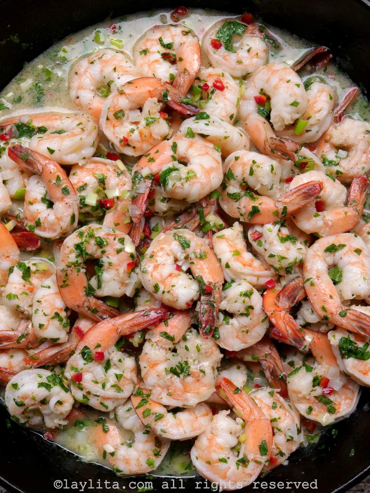 Overhead shot of garlic shrimp or camarones al ajillo in a skillet