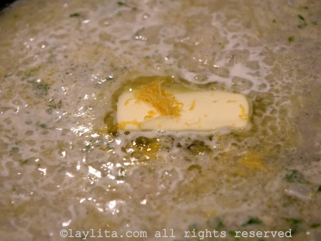 Wine, lemon zest and butter in a skillet