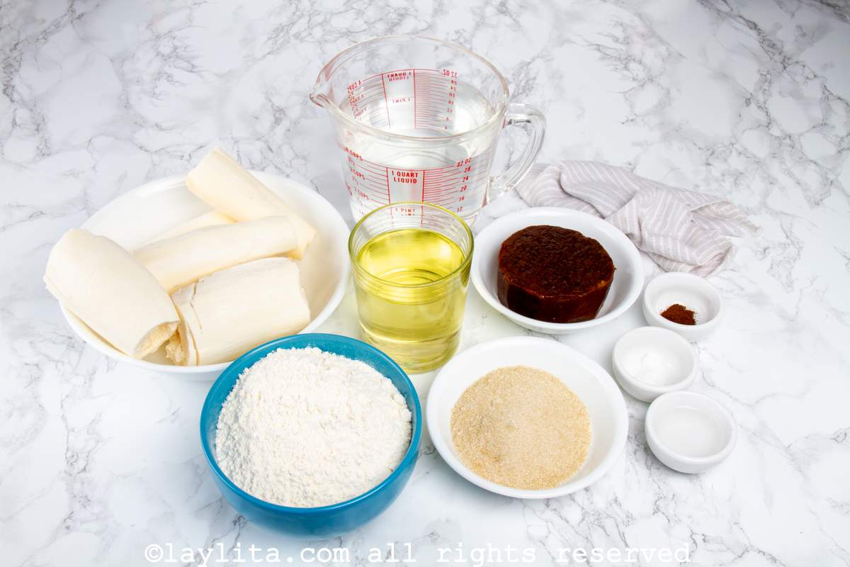 Ingredients needed for buñuelos de yuca on a kitchen counter.