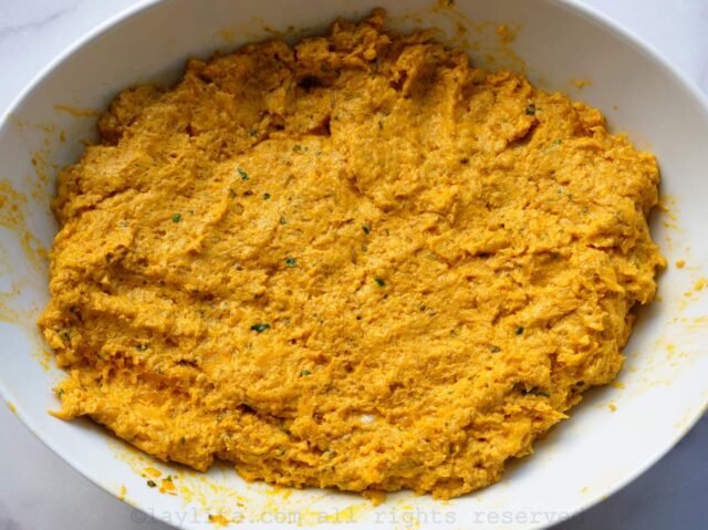Green plantain dough after being kneaded well in a bowl.