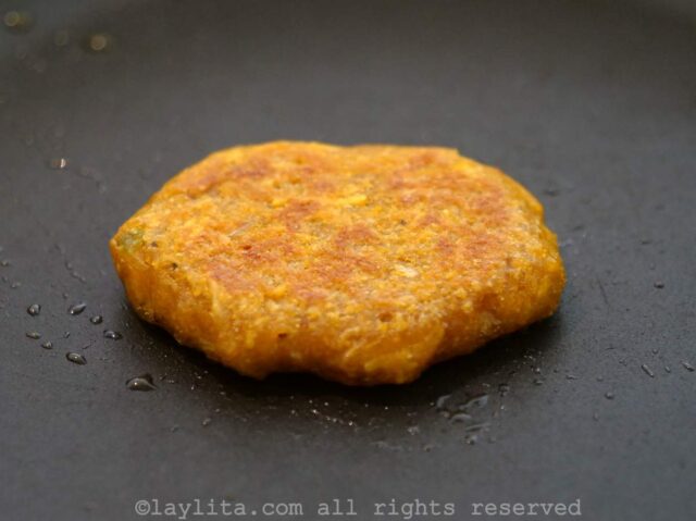 Small piece of dough in a skillet to taste the dough before making the corviches.