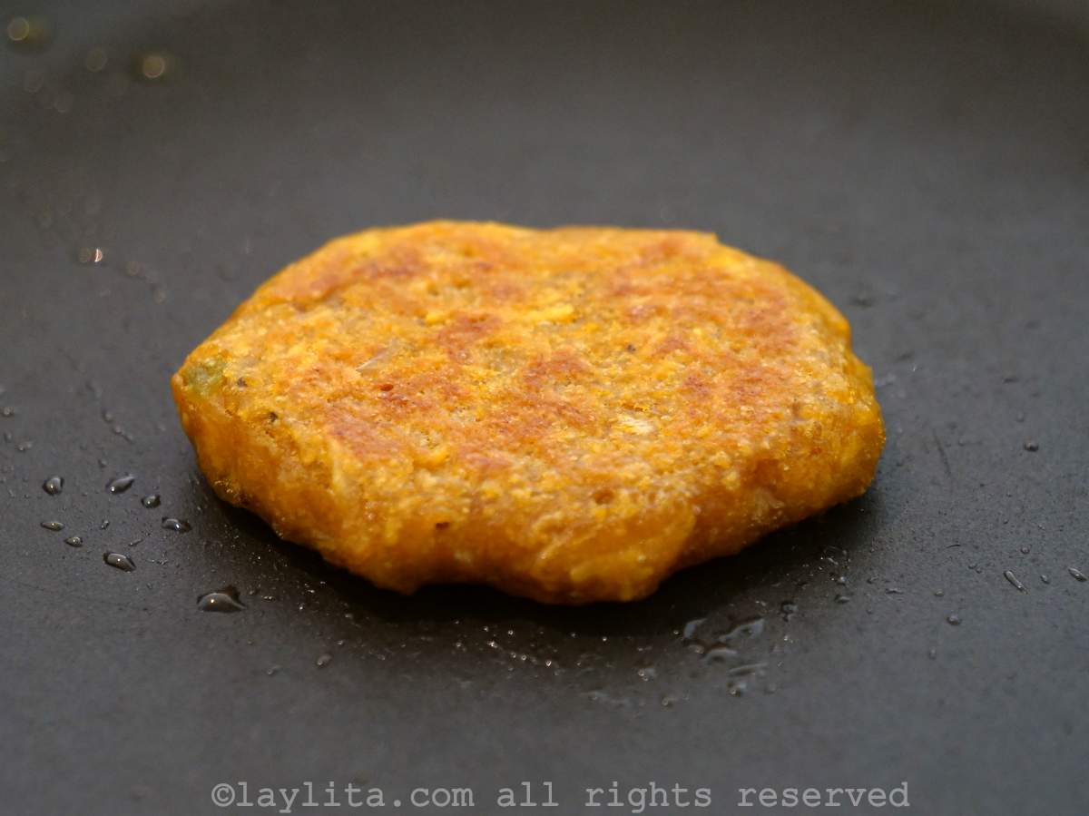 Small piece of dough in a skillet to taste the dough before making the corviches.