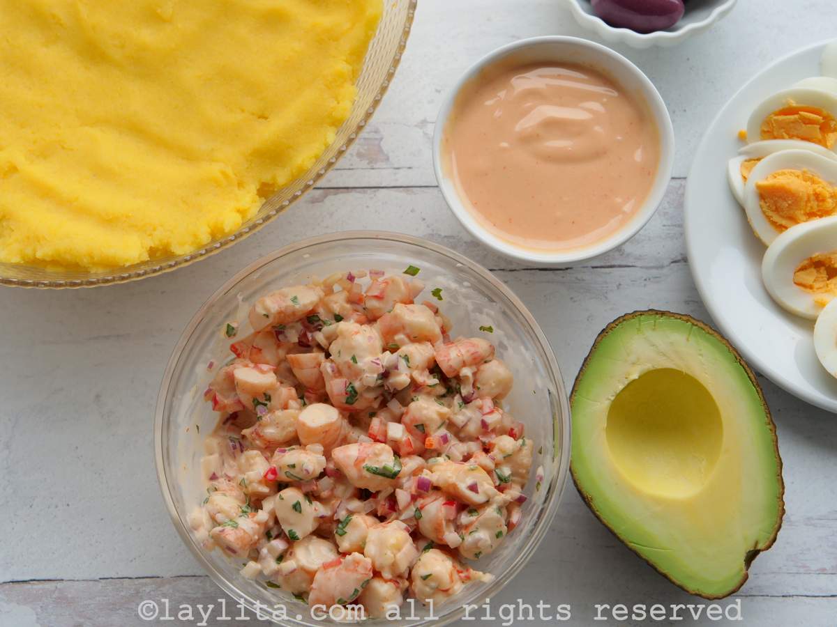 Overhead shot of prepped ingredients needed to make causa de camarones.