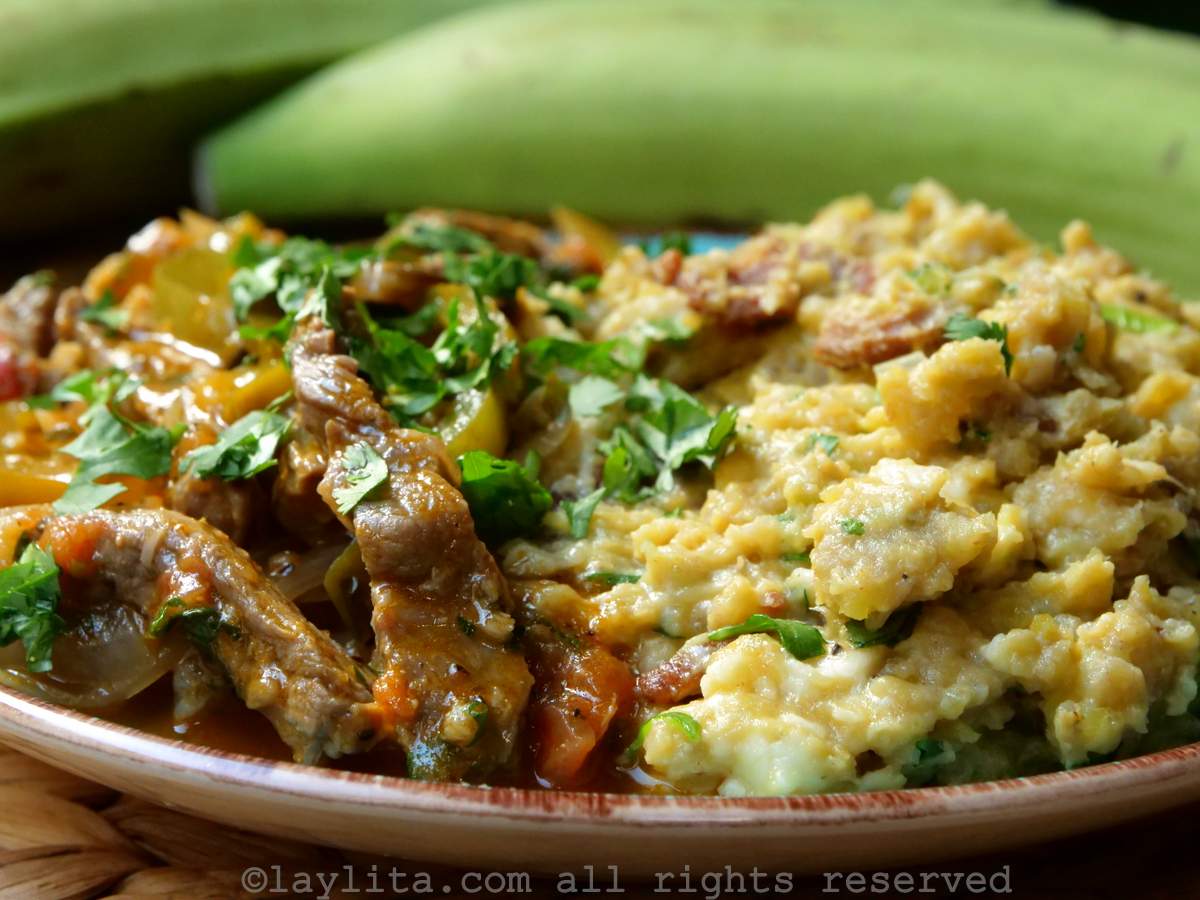 Plate with bistec de carne or sauteed beef pieces with tigrillo plantain mash