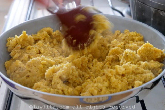 Mashed plantains in a pan.