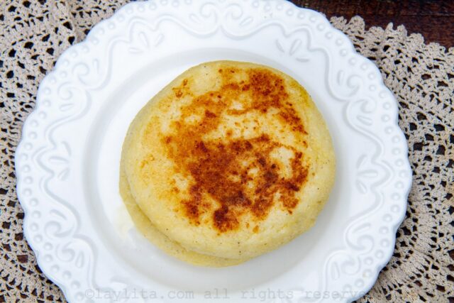 Colombian cheese arepa on a white plate