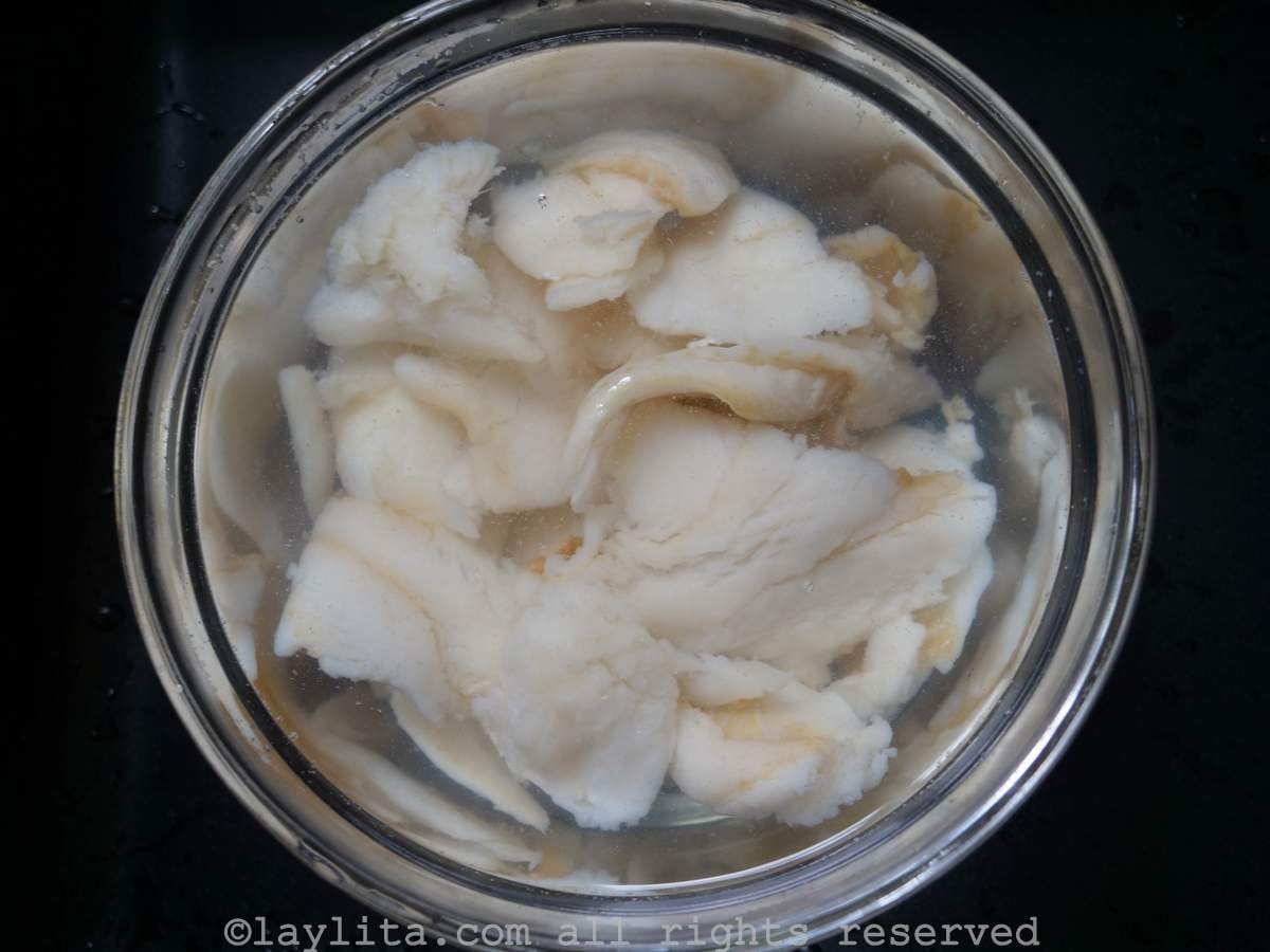 Salted cod in a bowl of water.