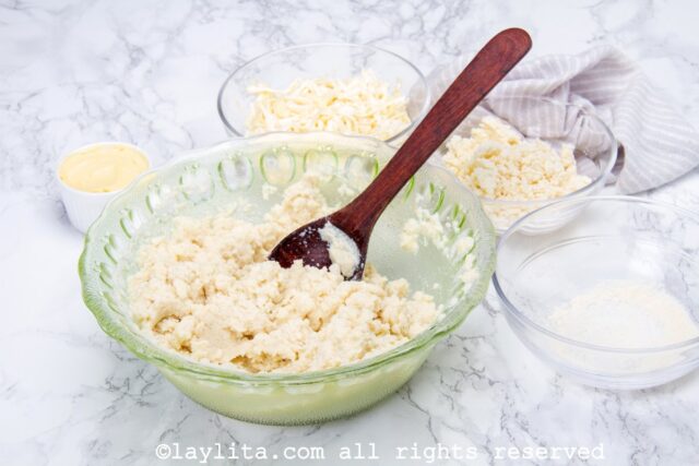 Mixing the corn flour and water to make arepas