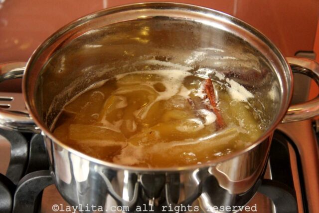 Babaco preserves simmering in a pot