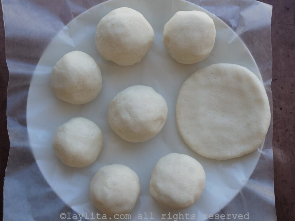 Forming the arepas before cooking