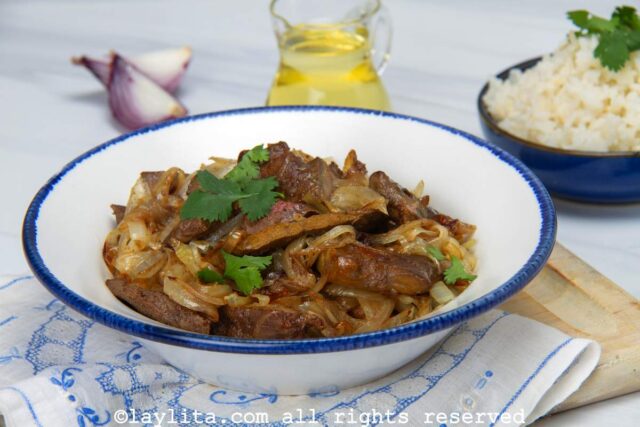 Blue and white serving bowl filled with liver and onions.