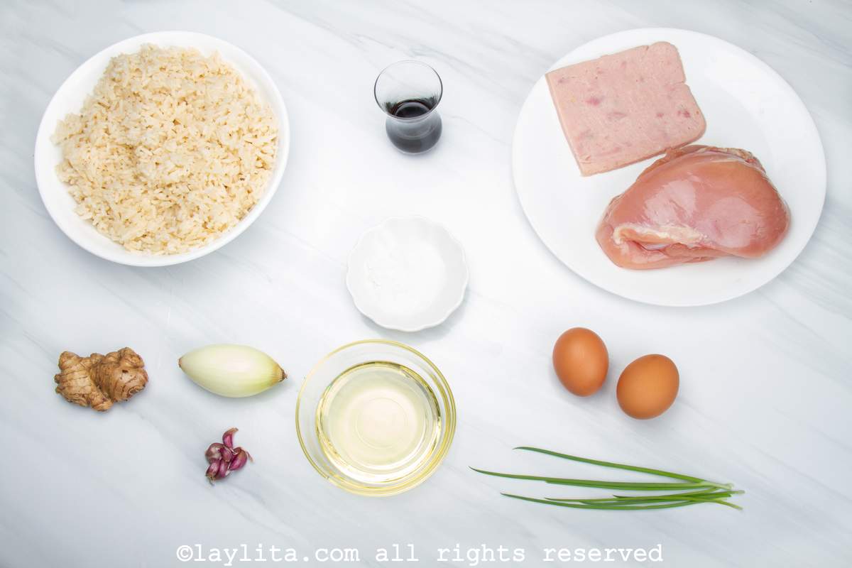 Ingredients needed to make Peruvian arroz chaufa on a kitchen counter. 