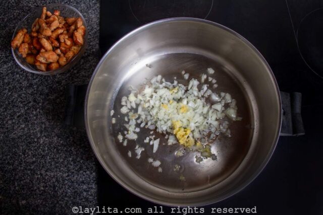 Cooking diced onion in a pan