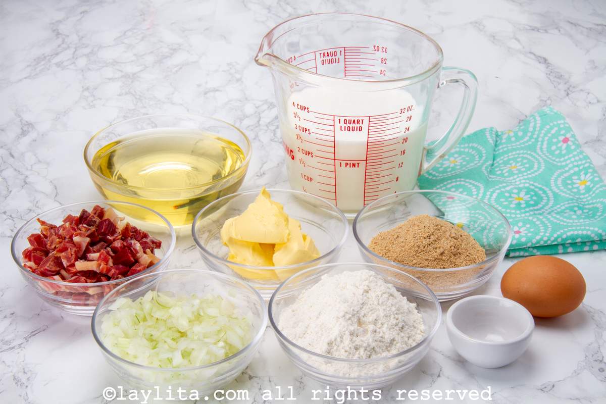 Ingredients needed to make Spanish ham croquettes or croquetas on a counter.