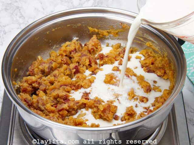 Add the milk to the pan to make a creamy roux bechamel sauce