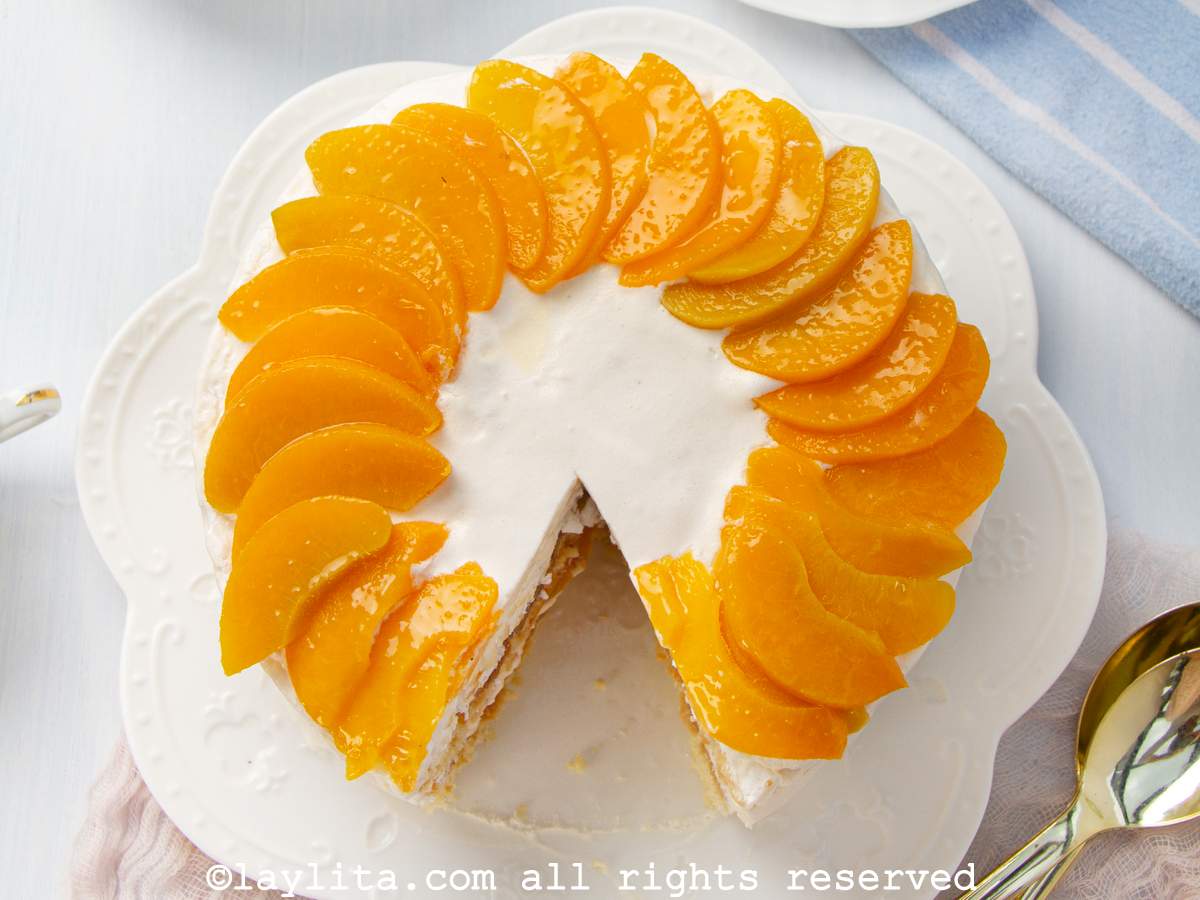 Chaja cake decorated with sliced peaches on top