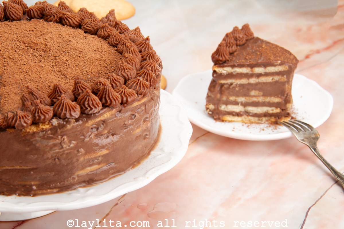 Side view of a slice of marquesa de chocolate on a plate to show the layers