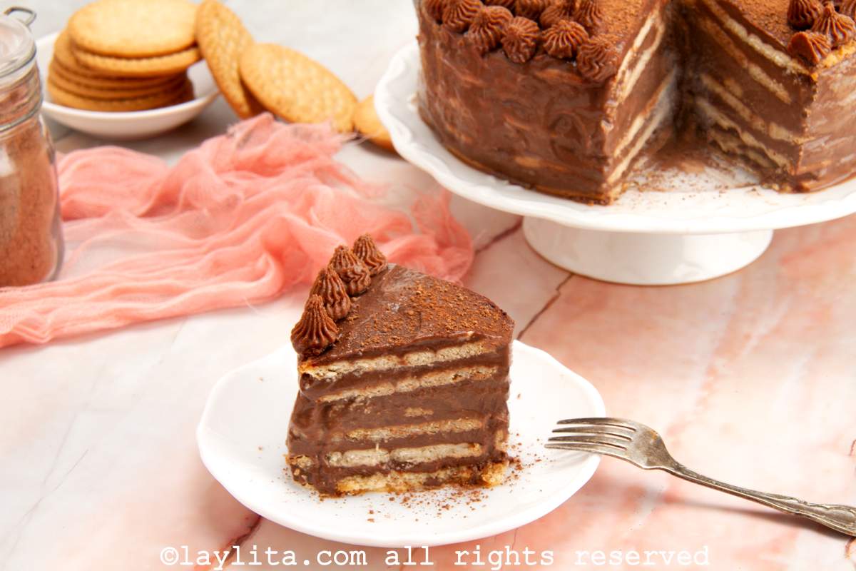Side view of a slice of marquesa de chocolate on a plate to show the layers