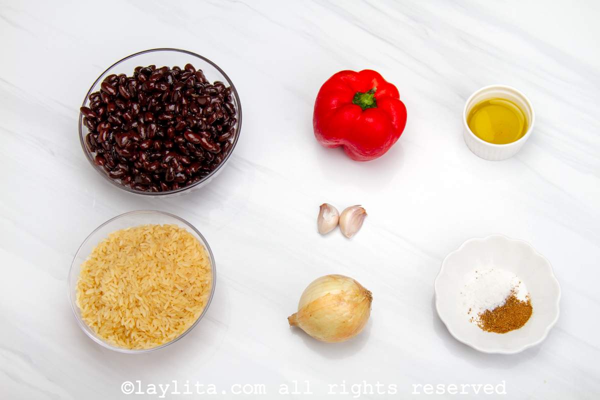 Ingredients needed to make Costa Rican gallo pinto style rice and beans on a white countertop