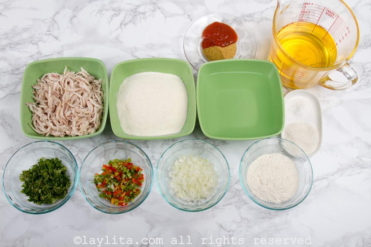 Ingredients needed to make Venezuelan empanadas on a kitchen counter