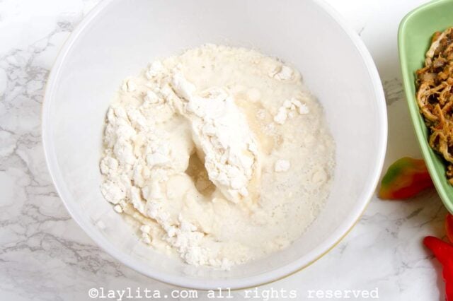 Cornmeal and water in a large mixing bowl