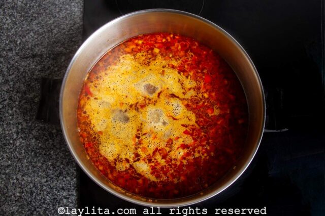 A pot with red liquid in it