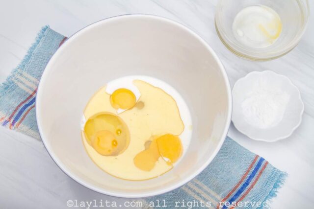 Eggs, milk and oil in a mixing bowl