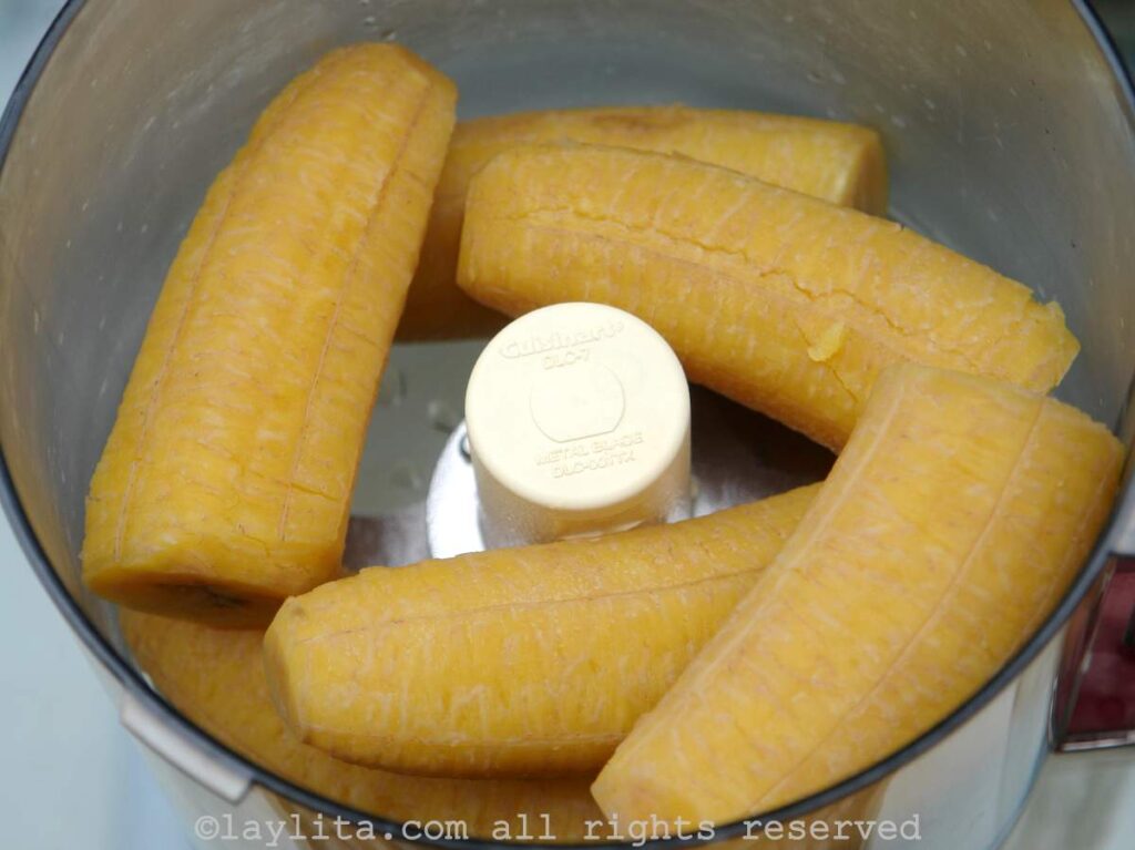 Boiled green plantains in a food processor