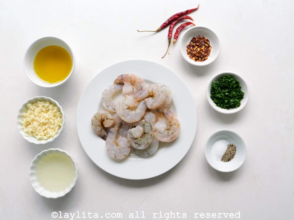 Ingredients needed to make gambas al ajillo on a kitchen counter.