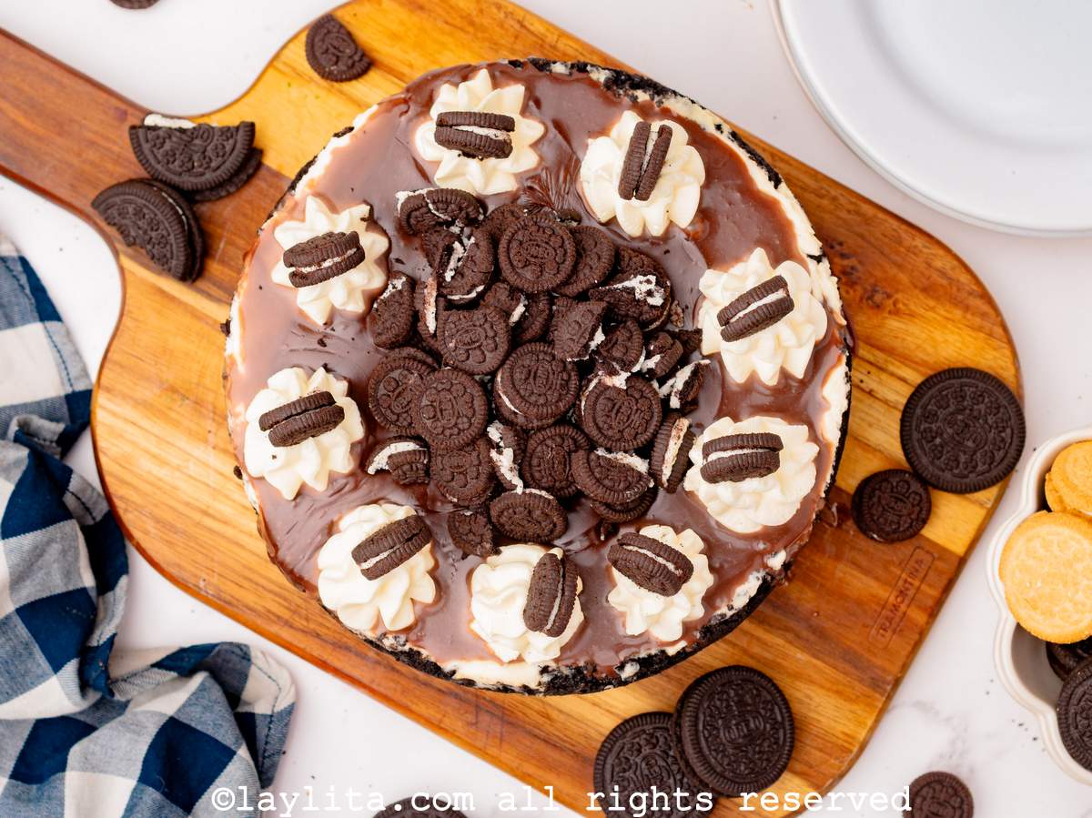 Cookies and cream cheesecake on a wooden board