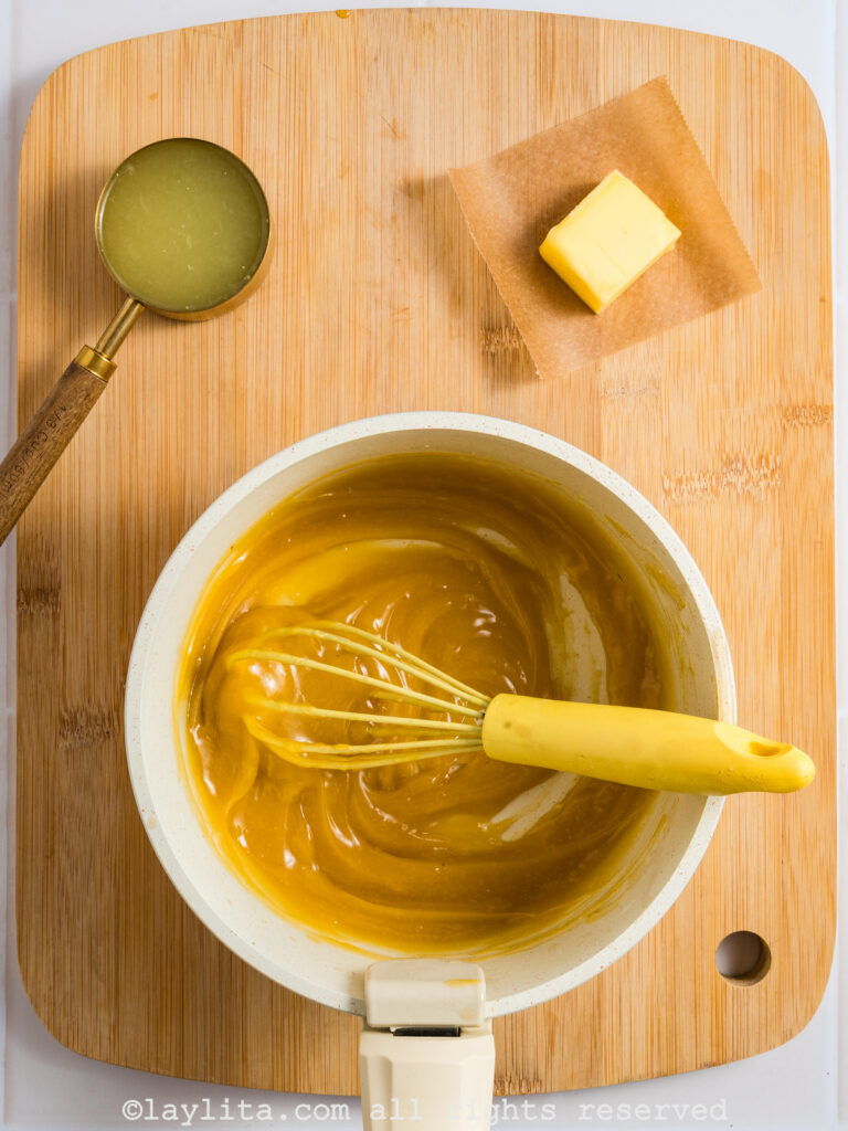 Tempering the egg yolks with the cornstarch mix