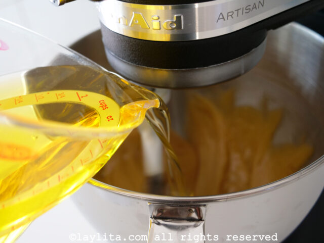 Gradually add the oil and continue beating.