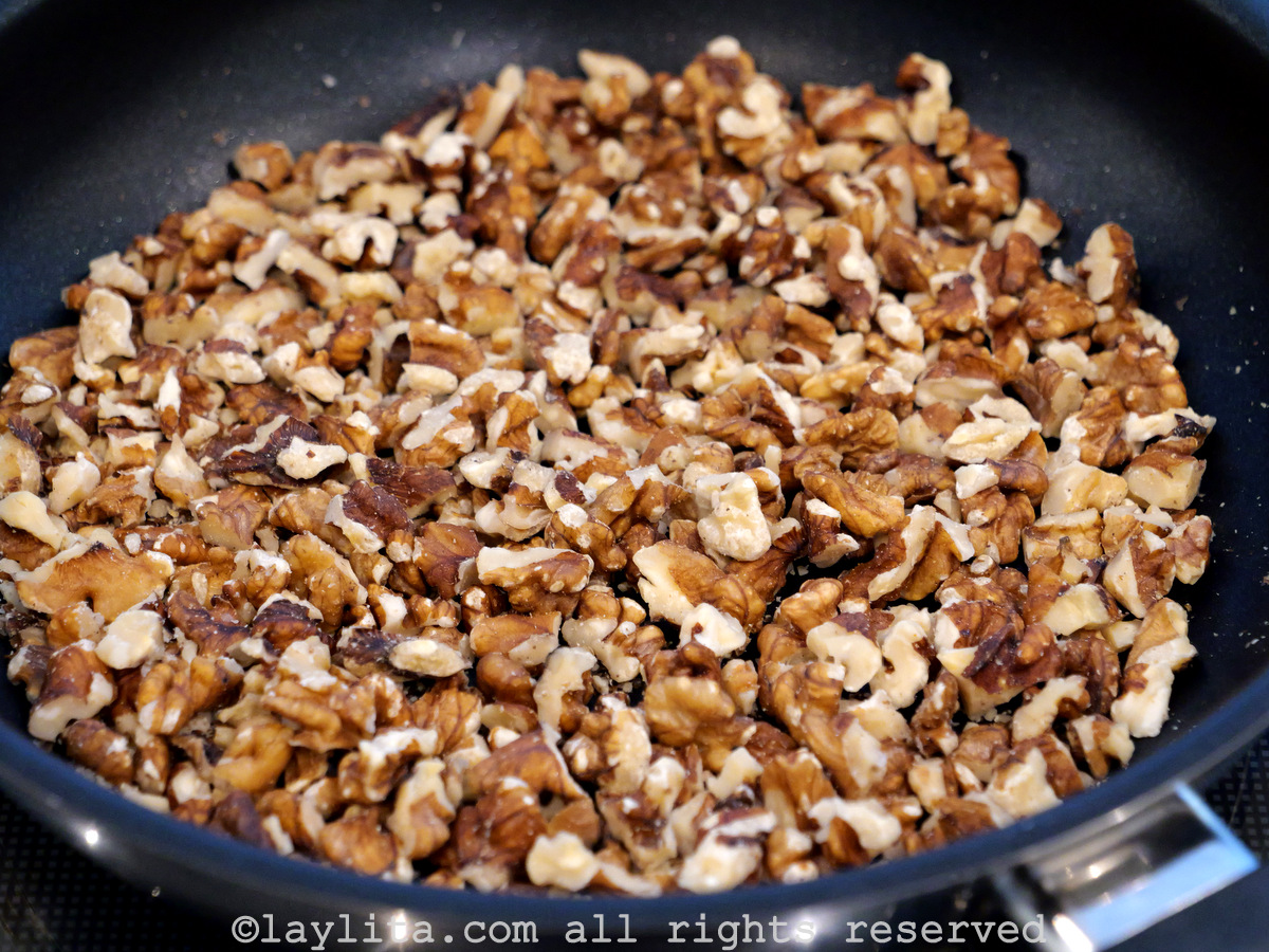 Nuts being toasted in a skillet